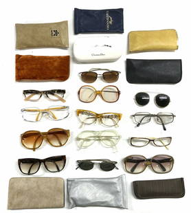 Lot 22 Glasses & Cases Eyeglass Bags: Lot includes 13 Glasses/frames & 9 Glasses Bags/Cases. Lot includes brands such as CHRISTIAN DIOR, FOSTER GRANT, SALVATORE FERRAGAMO, OPTYL & more. Largest glasses frames measure approximately 6 inche