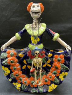 Mexican Dia De Los Muertos Ceramic Skeleton: Mexican folk art dia de Los muertos ceramic skeleton figural. Marked Mexico to underside. Some surface wear consistent with exposure. Measures approx. 8 x 3 x 10 inches. Folk art, Mexican folk art, sk