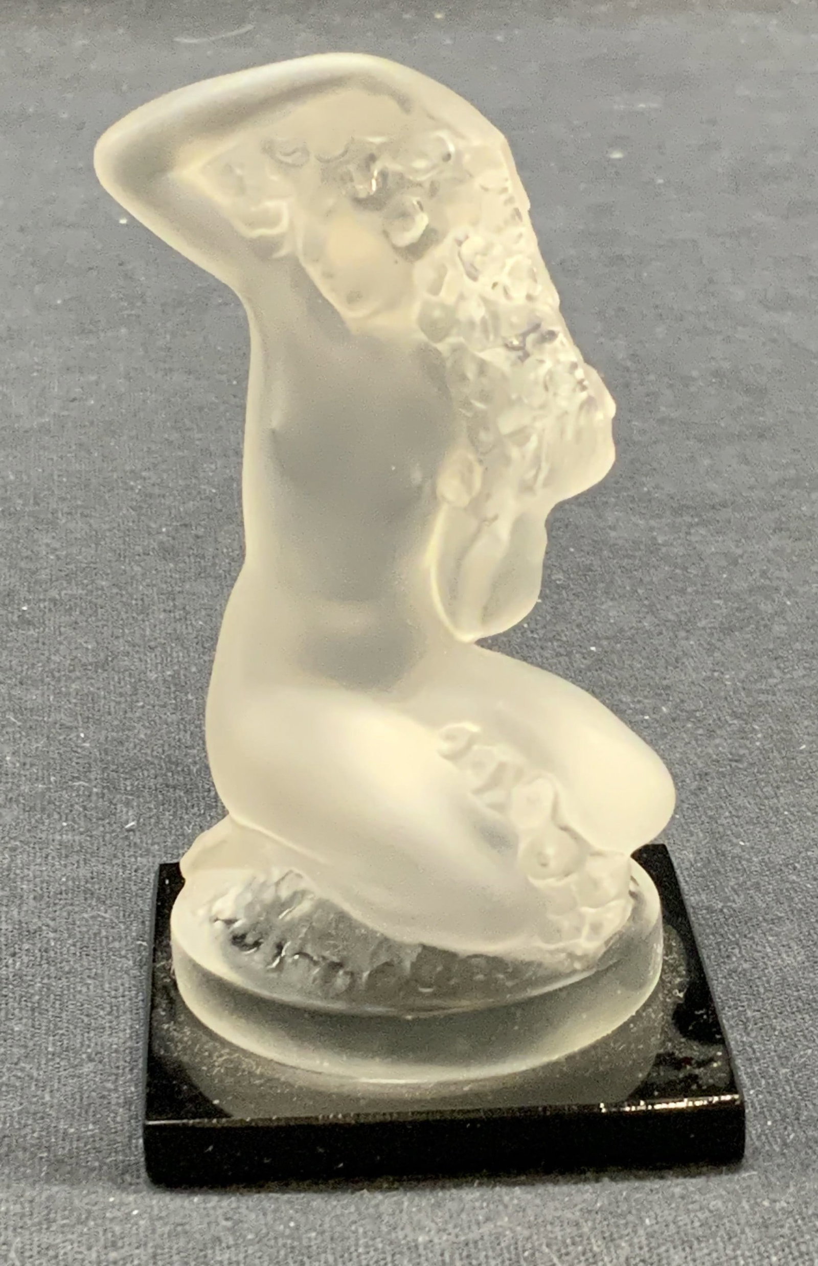 Lalique Crystal Nude Floreal Figural France: Lalique France. Crystal Floreal figurine paperweight of a nude woman. Signed along base. Made in france. Some surface wear consistent with exposure. Measures approx. 1 7/8 x 1 7/8 x 3.25 inches. Laliq