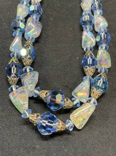 Blue Crystal Double Strand Choker Necklace: Blue crystal beaded double strand necklace. Measures approx. 13 inches long. Clasp needs repair. Some surface wear consistent with exposure. Estate jewelry, costume jewelry, cocktail jewelry, fashion