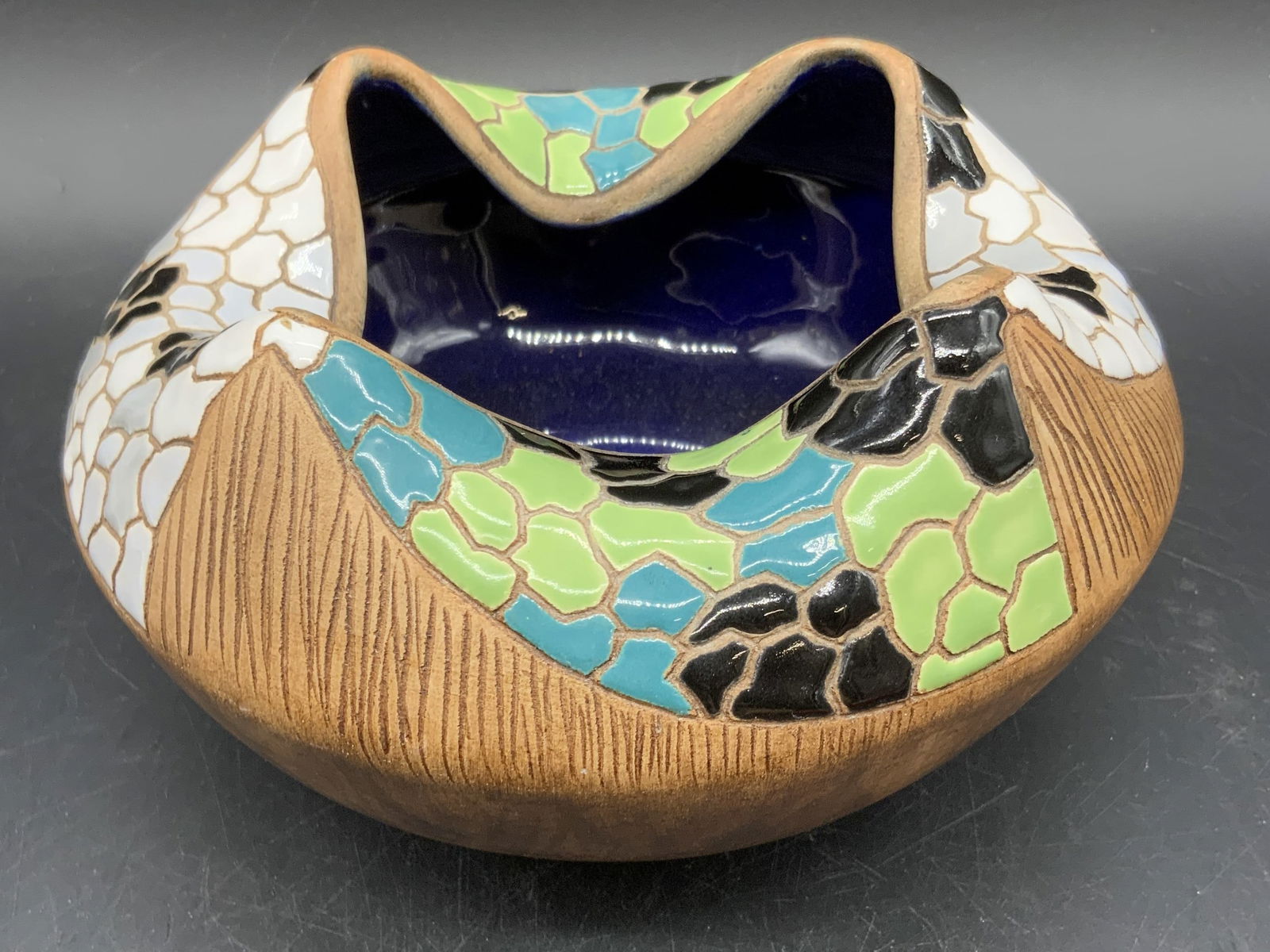 KERAMOS 523 Hand Painted Pottery Vase, Israel: A vintage hand painted artisan pottery vase. Piece features glazed and unglazed pottery designs. Pinched mouth accented by a cobalt blue glazed interior and a mosaic rim. Etched pottery designs betwee