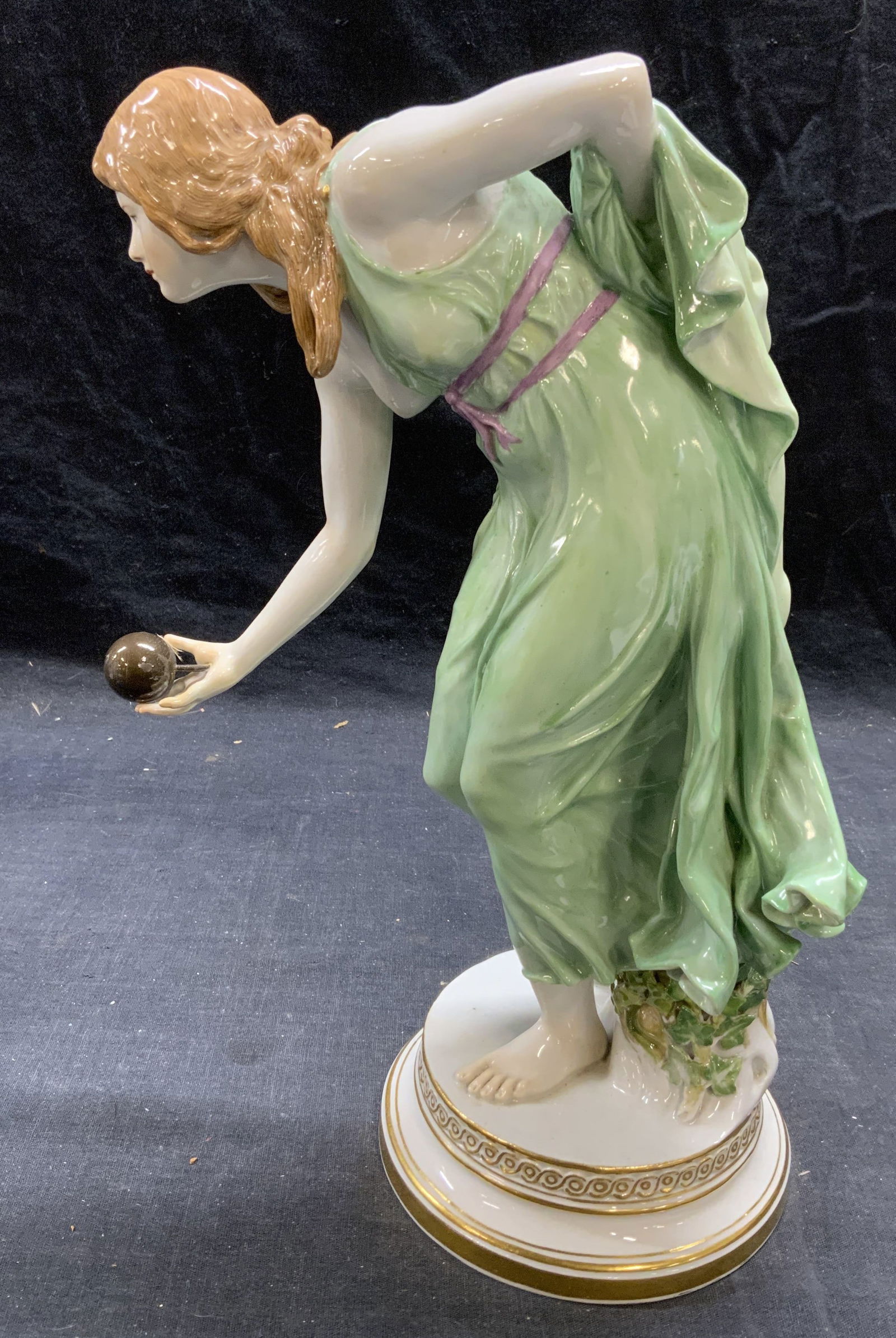 Antq Meissen StylePorcelain Kugelspielerin Figural: Antique Meissen style porcelain Kugelspielerin figural after Walter Schott. Marked Q 780 to underside. Piece is heavy. Measures approx, 8 inches wide and 11.5 inches tall. Some surface wear consistent
