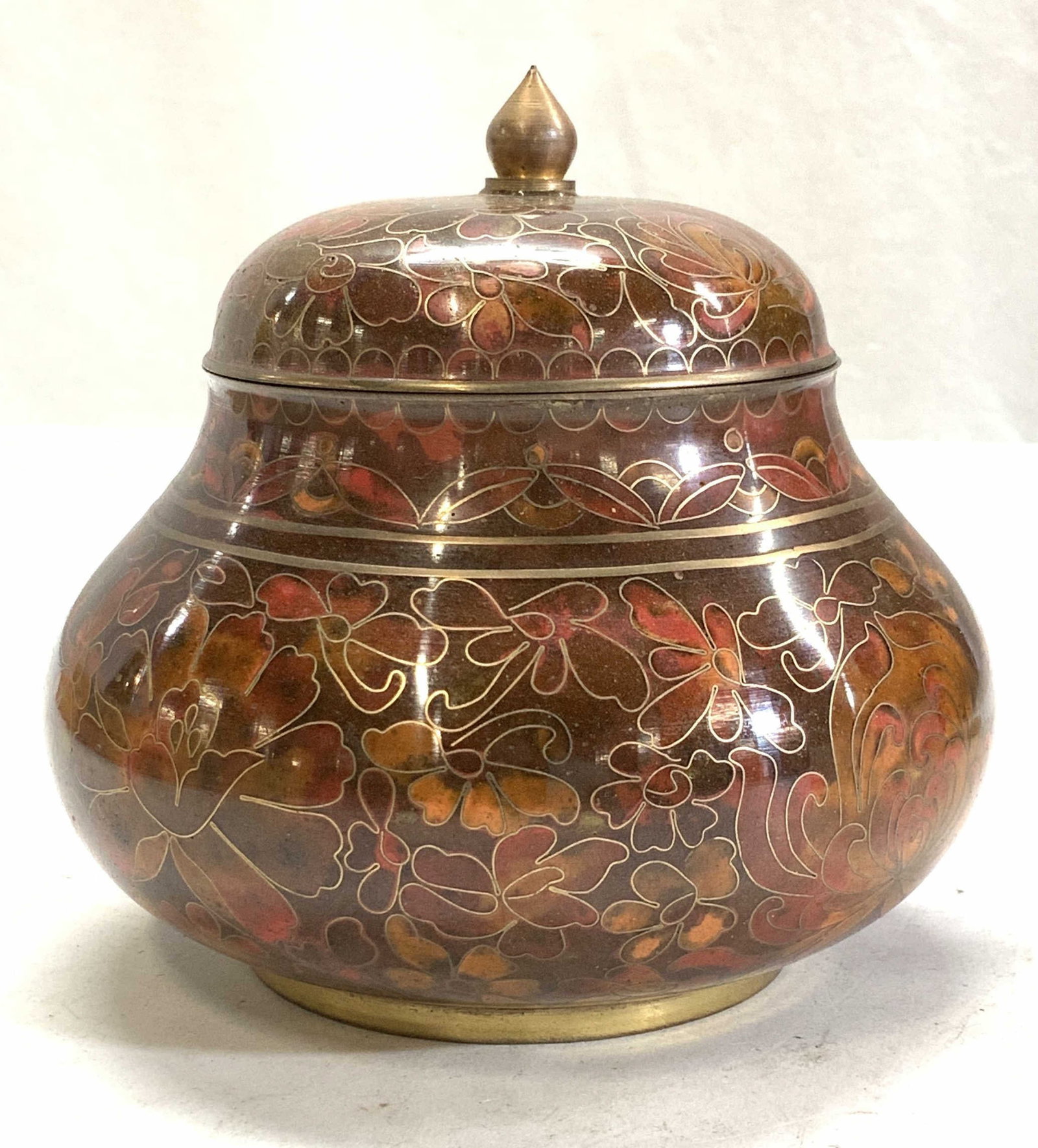 Asian Cloisonne Lidded Bowl: Autumn color Cloisonne Lidded bowl with lotus flower and thunder and cloud pattern in lid. Burnt orange, brown and red enamel flowers outlined in gilt, hand painted enamel on brass with JingTai sky bl
