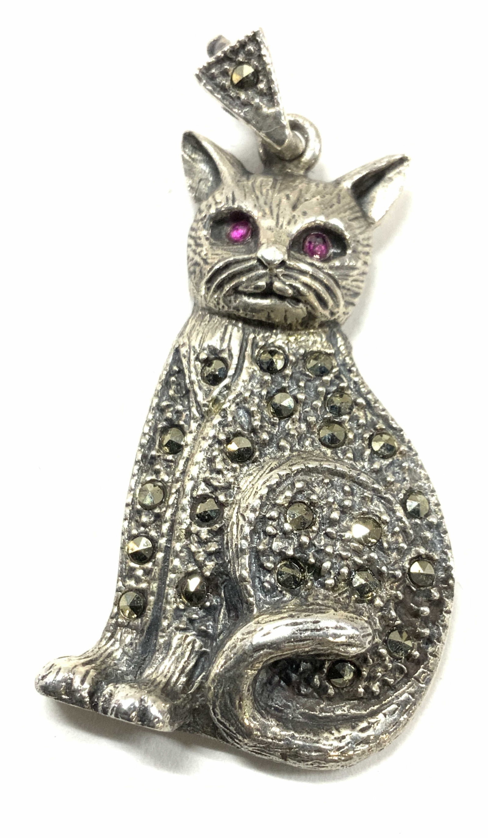Sterling silver Marcasite Cat Pendant: Cat pendant with Marcasite and red eyes. Marled 925. Appears to be hallmarked TTP. 1.5 in. Long. .24 ozt Luxury Statement jewelry, Luxury Chunky Jewelry, Luxury Estate Jewelry, luxury vintage jewelry,