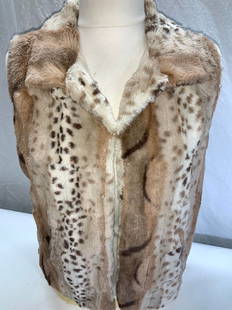 Faux Fur CEJON Vest: Animal print soft hand polyester faux fur vest , size Large. Polyester satin linking with light blemishing. Hook and loop closure with hand pockets. Casual wear, vest, Faux Fur Vest, Fashionista, Fall