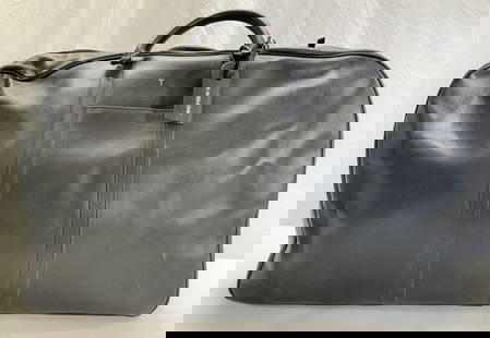 T. ANTHONY Oversized Leather Duffel, Italy: Luxury T Anthony black leather footed oversized duffel bag with luggage tag. Luggage Tag signed T. Anthony. Bag signed with name plate on interior. Measures 29 x 9.5 x 18 in. LxWxHt , like new , seldo