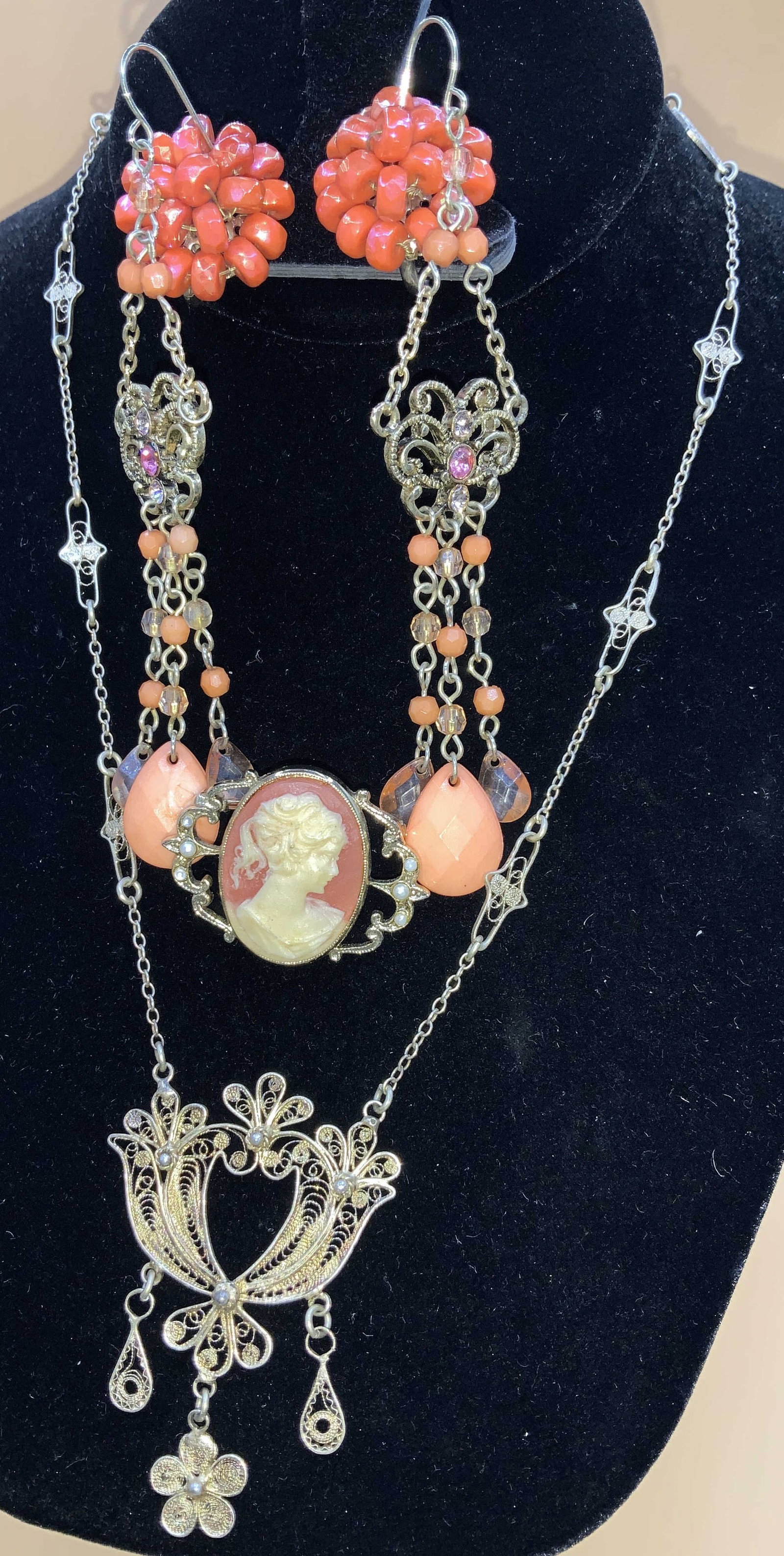 Vogue Clip On Earrings Victorian Fashion Jewelry 6: Lot of Victorian Style Fashion jewelry including resin cameo brooch, chandelier earrings 3.25 in. L, filigree gold tone necklace with pendent , 14 in. L, and iridescent Coral- Orange faceted bead clip