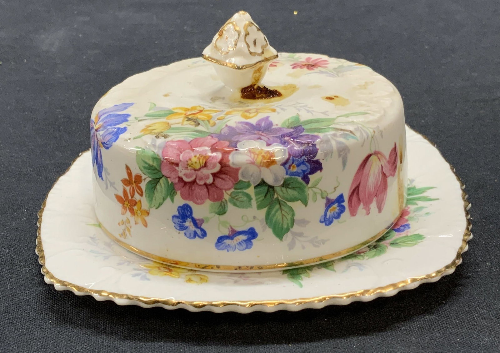 Royal STAFFORD China Floralia Covered Dish England: Royal STAFFORD bone china Floralia pattern dove red dish. Some surface wear consistent with exposure. Trademarked to underside of dish. Made in England. Measures approx. 5 1/8 inches wide and 2.5 inch