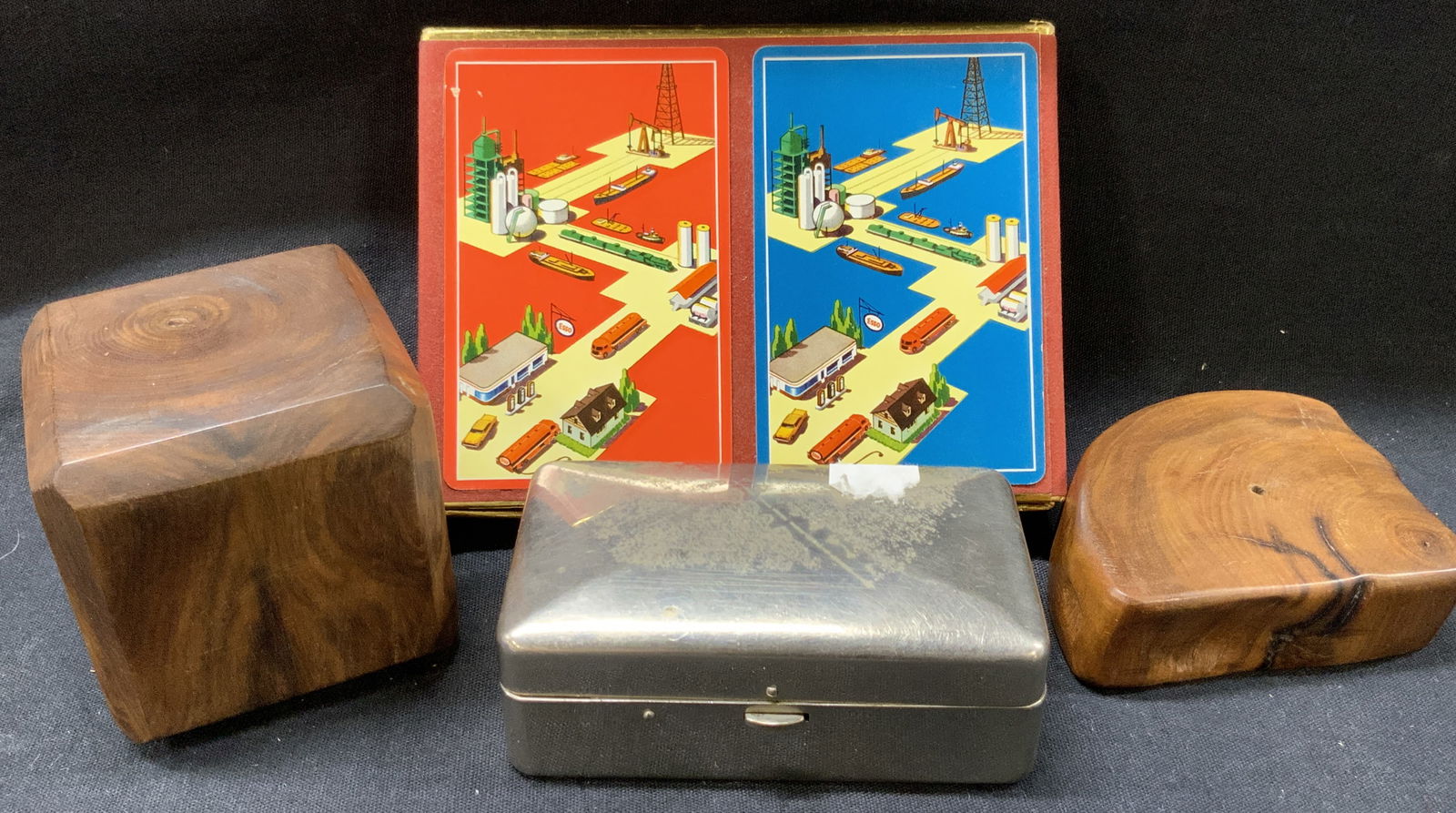 Lot 4 Desk Accessories, Playing Cards & More: Lot of 4 desk accessories. 1 set of playing cards, with backside of case reading Esso Standard Oil Company. 1 Metal jewelry box, at 2 x 3.5 x 1 inches. And two wooden paperweights, 1 cube at 2.25 x 2.
