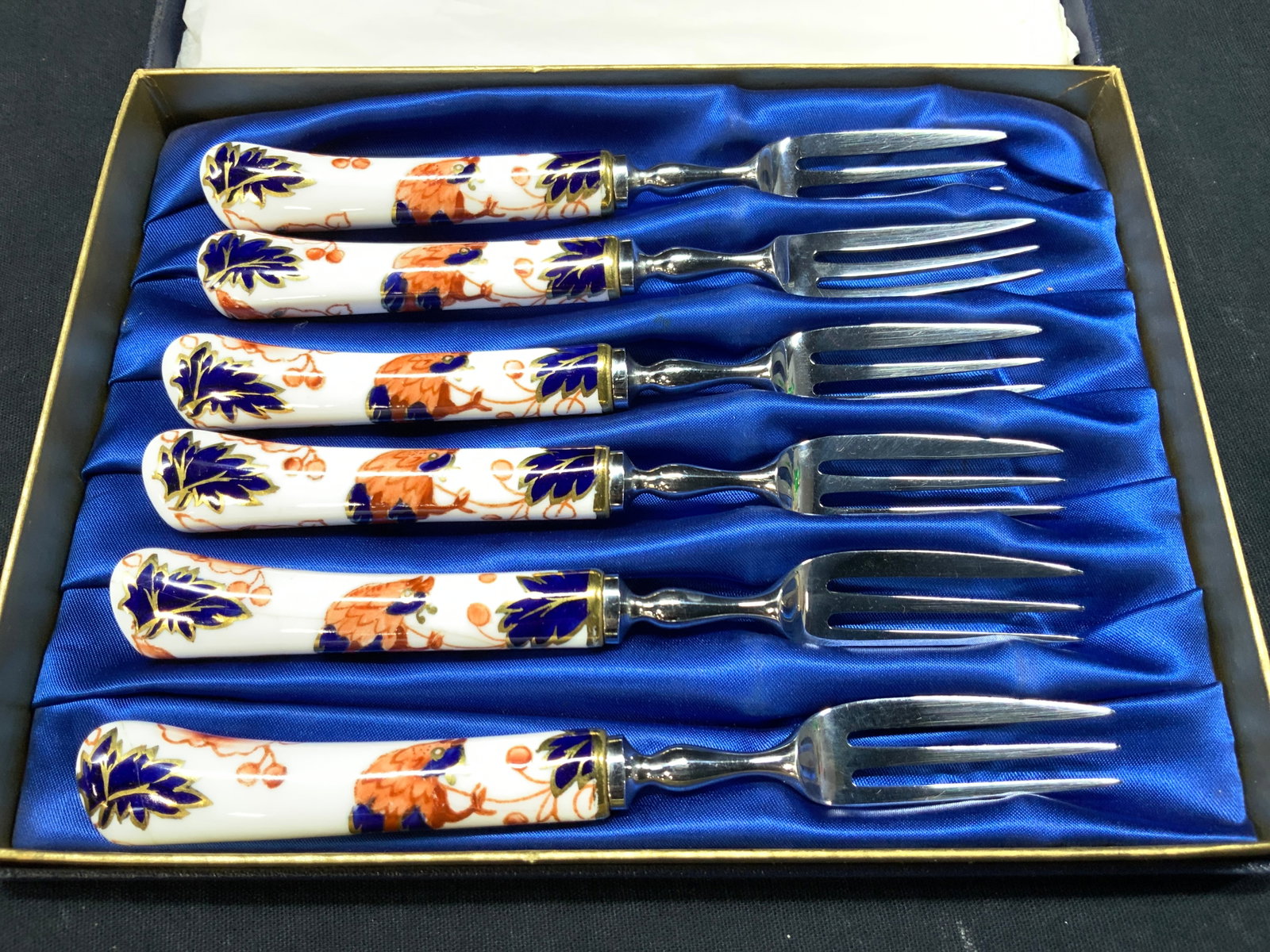 6 CoalPort Cutlass Fine Bone China Cocktail Forks: Set of 6 fine bone China cocktail forks with hand painted Asian style motifs of birds with gilt accents and outlines. Comes in original box, marked CoalPort, cultuss, fine bone China, Sheffield Cutler