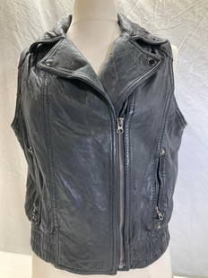 BARNEYS NY Leather Vest Jacket: Barneys New York Soft leather vest jacket, zipper and snap closure, zipper pockets. Black cotton lining. Size large. 36 in. Waist. Barneys Leather Vest, Black Leather Outerwear Vest, Fall casual leath