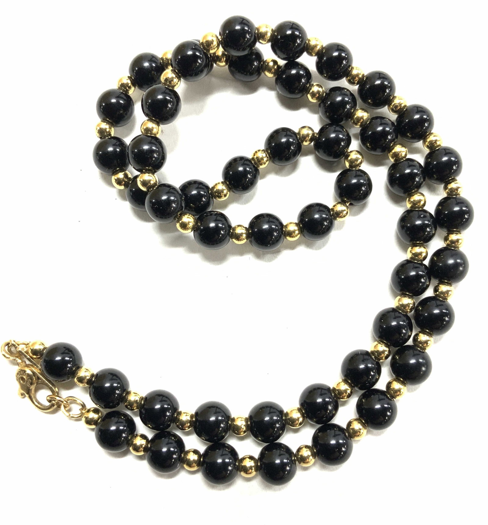 MONET Black &Gold Tn Alternating Bead Necklace: Signed Monet Necklace, 7 in. Drop with alternating gold tone and black beads. Lobster clasp. Signed Jewelry, Necklace, designer Monet necklace, Black and gold tone beaded necklace, costume jewelry, fa