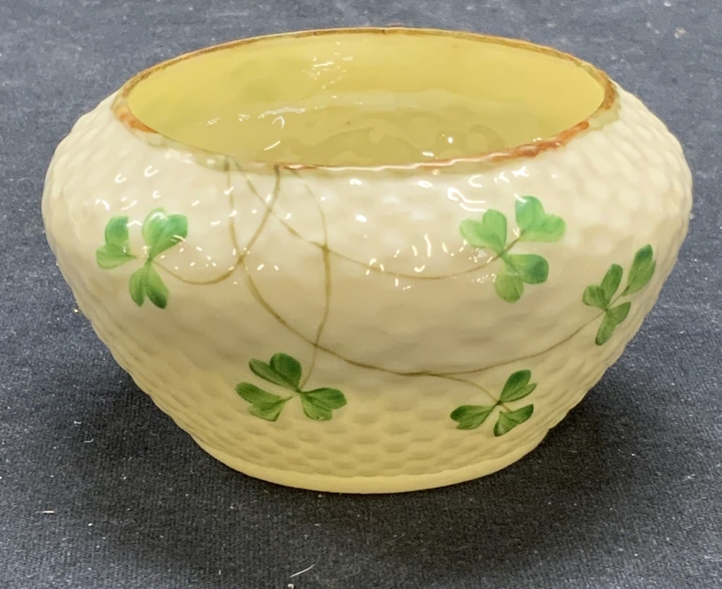 BELLEEK China Shamrock Sugar Bowl, Ireland: BELLEEK china shamrock basket weave sugar bowl. Trademarked to underside. Made in Ireland. Measures approx. 3.5 x 2 inches. Some surface wear consistent with exposure. BELLEEK, BELLEEK sugar bowl, sug