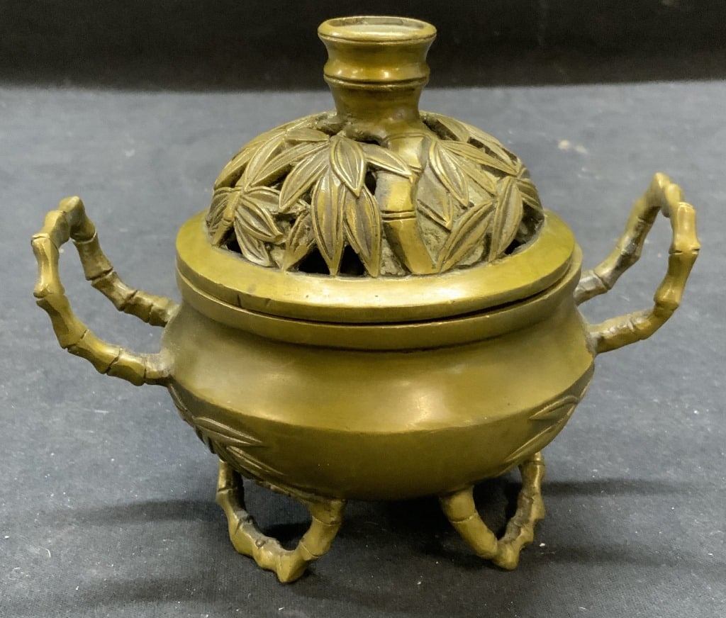 Stamped Chinese Bronze Incense Burner: Stamped Chinese bronze incense burner with bamboo motif. Stamped to underside. Some surface wear consistent with exposure. Measures approx. 5.5 x 4 x 4.75 inches. Incense burner, bronze incense burner
