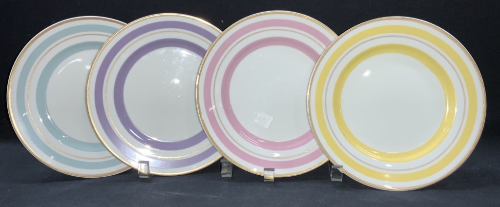 4 William Sonoma Porcelain Dishes, Japan: Set of 4 white porcelain and colored banded dishes, marked William Sonoma, made in japan. Each with its one color and gilt rims, approximately 8 inch diameter Moderate wearing to centers due to previo