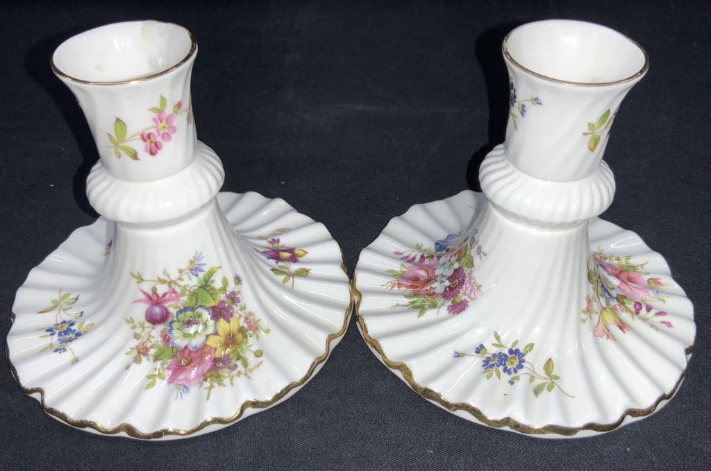 Pr Hammersley Fine Bone China Candle Holders: Marked hammersley, fine bone China, made in England. White toned with ruffled base and gilt rims with floral motifs throughout, Approx 4 inches tall. Minor wearing to gilt and to flower designs. Hamme