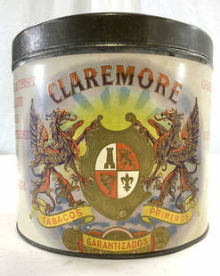 CLAREMORE Circular Vintage Lidded Tobacco Tin: Tin reads CLAREMORE. Piece has crest coat of arms detail. Tin is circular shaped and includes lid. Piece measures approx 5.5 inches tall 6 inches wide. Tin, tobacco tin, CLAREMORE tobacco tin, vintage