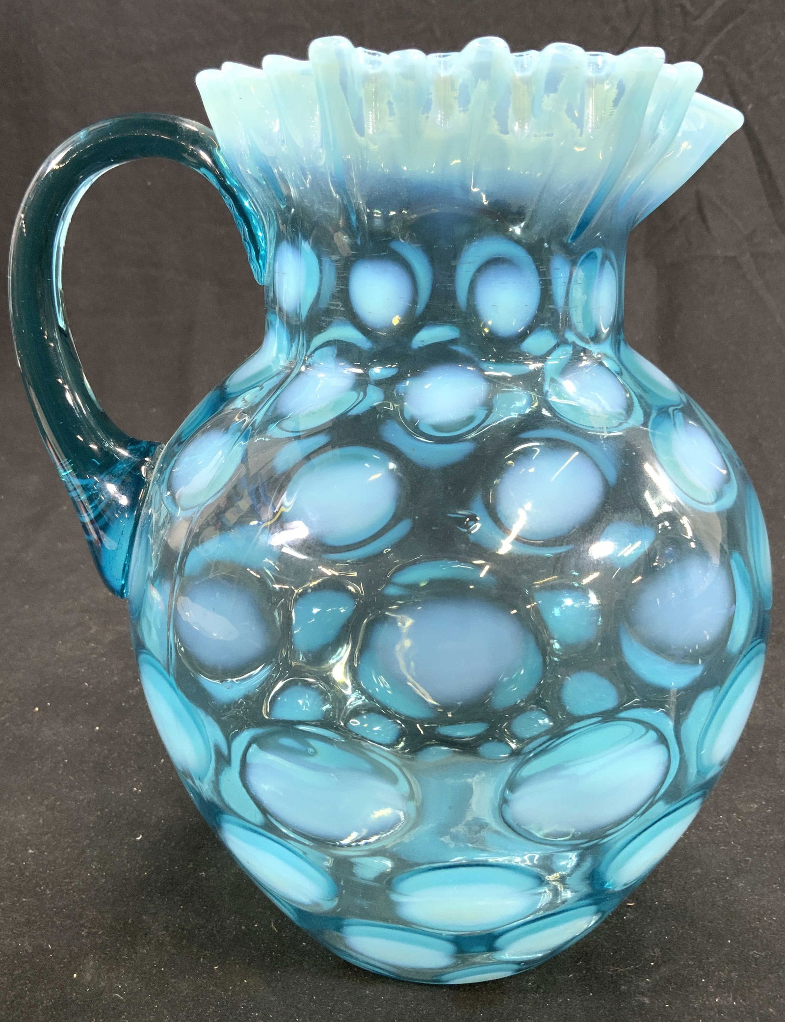 FENTON Vntg Opalescent Art Glass Pitcher: Pitcher appears to be FENTON (No apparent markings). Pitcher is aquamarine toned opalescent glass with areas of dot detail & handkerchief style rim. Piece appears to be hand blown. Vessel measures app