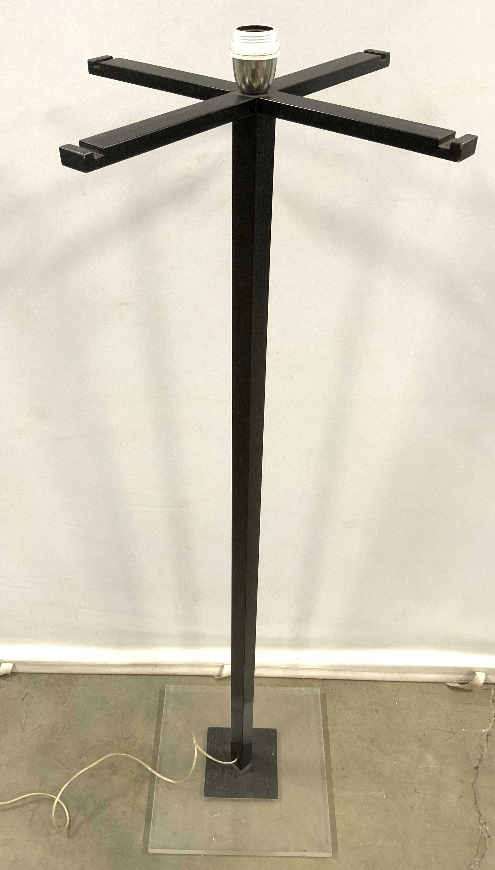 Lucite & Veneer Floor Lamp: Lamp has square shaped base which appears to be lucite. Top of lamp is black toned & appears to possibly be wooden possibly veneer. Piece measures approx 54 inches tall 14 inches wide. Lamp, floor lam