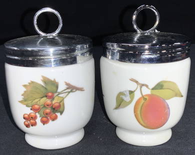 Pr Royal Worcester Porcelain Egg Coddlers: Pair of white porcelain salt cellars / egg coddler with metal screw caps. Marked Royal Worcester, porcelain on undersides. Approximately 4 inches tall Moderate wearing to metal caps and undersides, mo