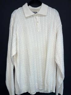 Kirkland XXL 100% Cashmere Sweater, Italy: Marked Kirkland signature. XXL 100% Cashmere, made in Italy. Off white woven long sleeve sweater. Approximately 23 inches wide from armpit to armpit and 18 inches long from inner arm stitching. Modera