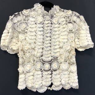 Antique Hand Crafted Lace Blouse: Antique, possibly vintage hand crafted lace blouse ruffled patterns and button up backing, Chest measures 16 inches wide and 10 inches long from inseam in arm. Evident discoloration due to age and use