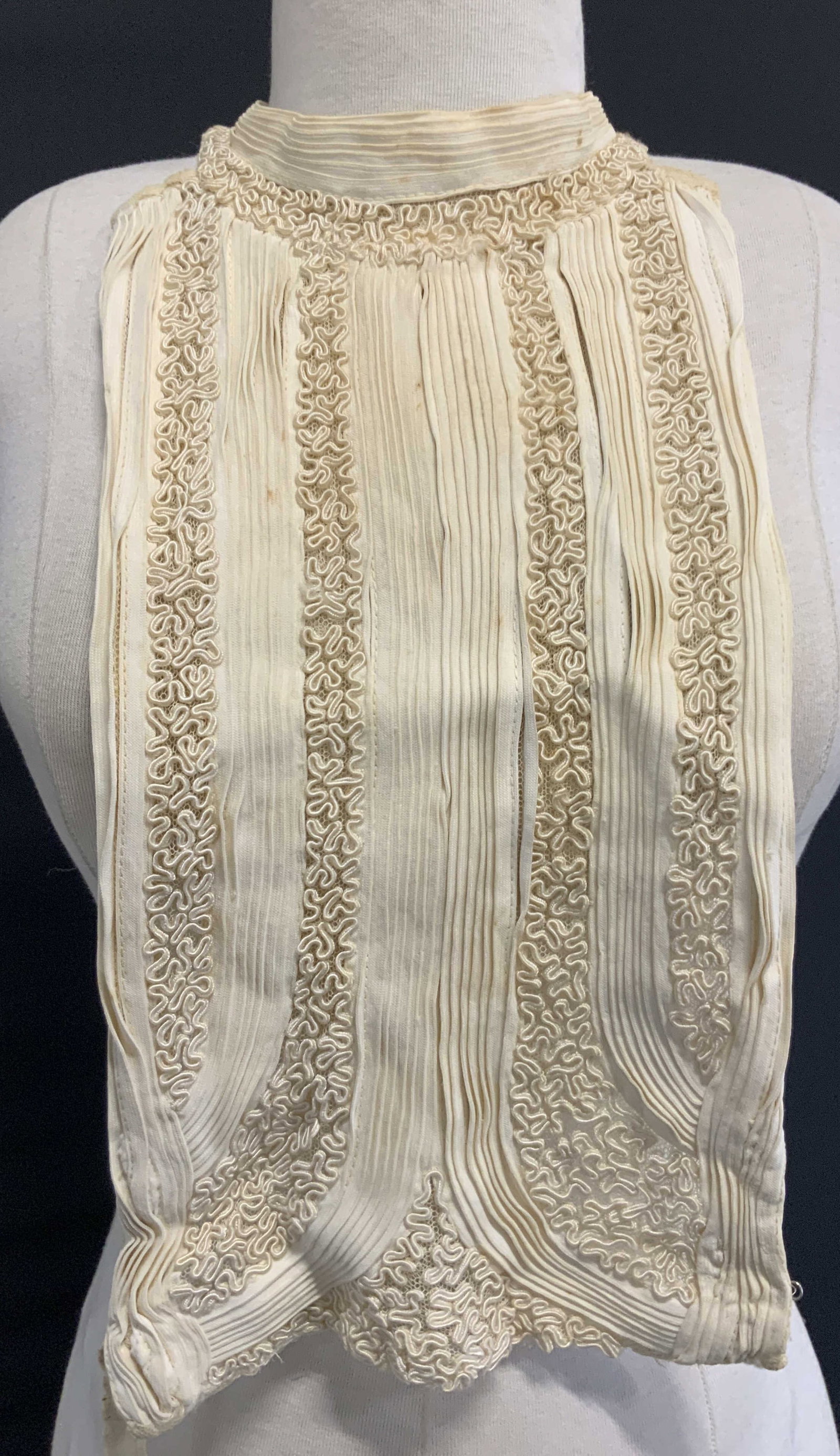 Antique Hand Stitched Lace Ruffle Dickey: Antique hand crafted ruffle and lace Dickey with back neck snaps and strap for back. Approximately 15 inches long and 7.5 inches wide. Neck line is approximately 3 inch in diameter. Evident blemishes 