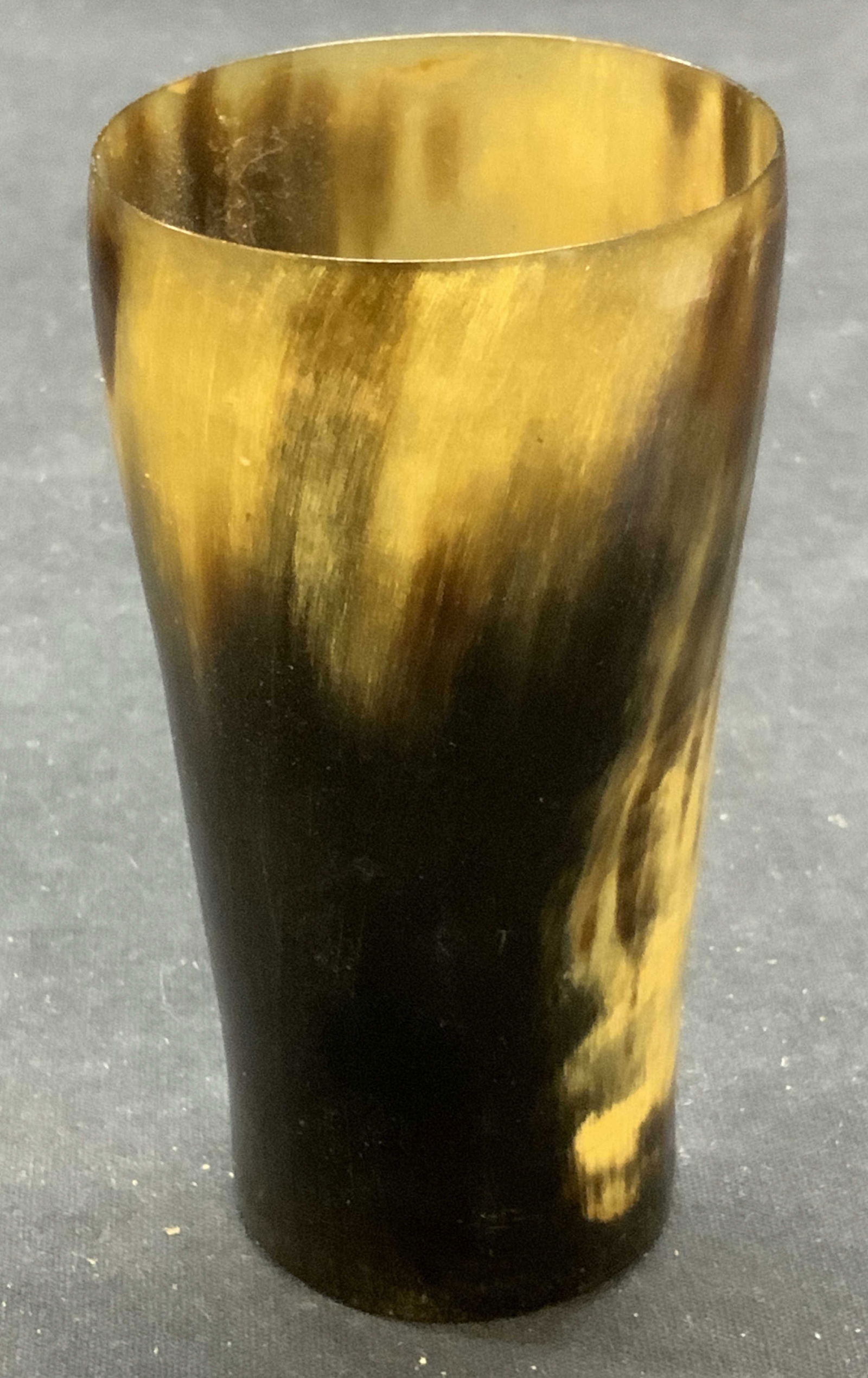 Antique Victorian Bone & Glass Cup: Antique Victorian era bone cup with beveled glass base. Surface wear including crack and chipping observed. Measures approx. 2.25 x 4.5 inches. Includes card from Dawn Hill Antiques. Bone cup, antique