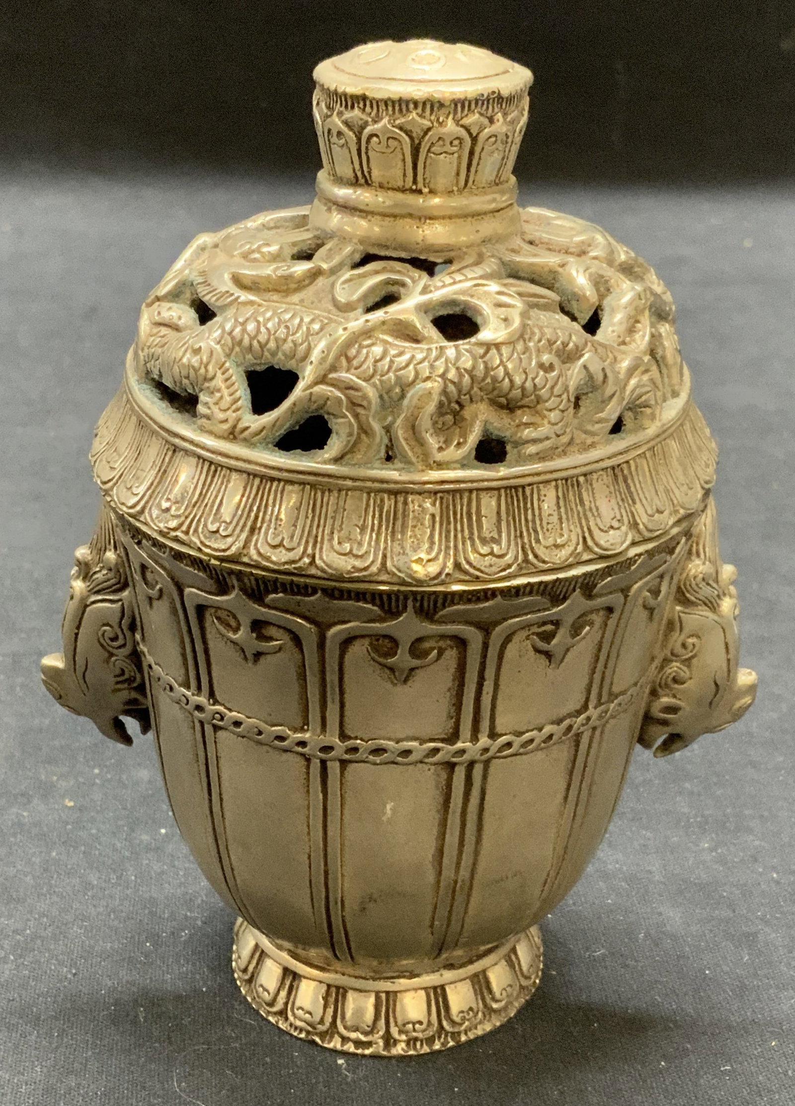 Stamped Chinese Metal Dragon Incense Burner: Stamped Chinese incense burner with dragon motif. Possibly silvered bronze. Stamped to body. Some surface wear consistent with exposure. Measures approx. 3.25 x 5.5 inches. Chinese incense burner, Asi