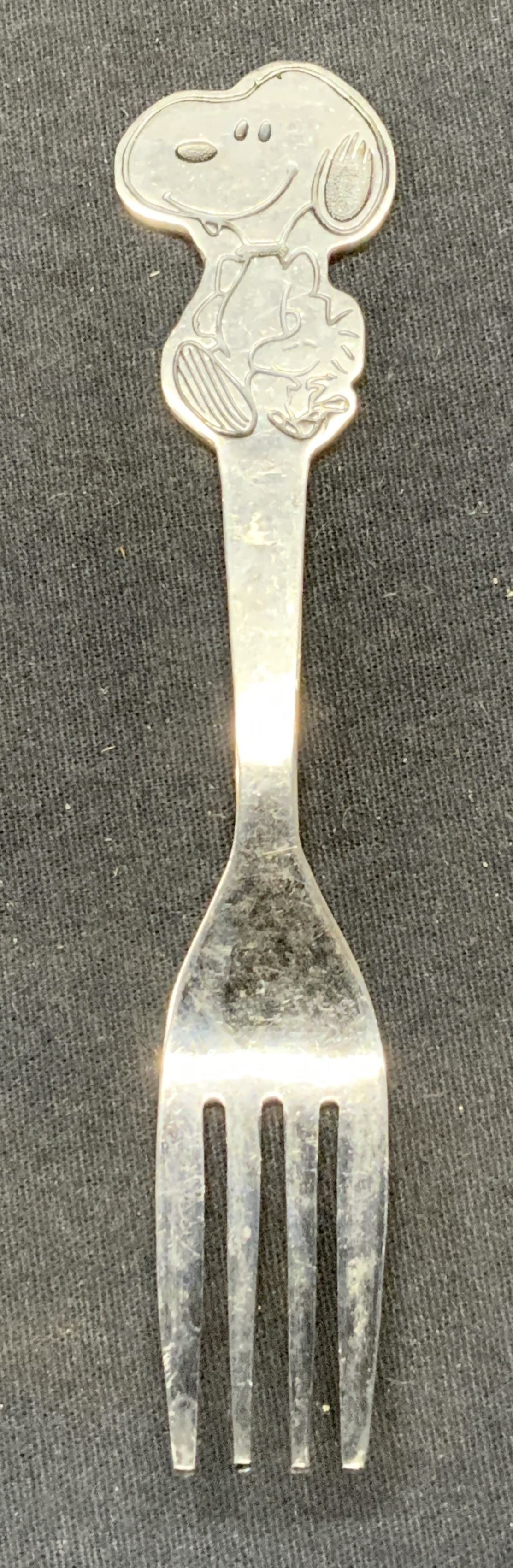 Vintage 1965 Danara Snoopy Fork: Vintage 1965 Danara Peanuts Snoopy fork. Stainless steel. Made in Korea. Trademarked to underside. Some surface wear consistent with exposure. Measures approx. 5.5 inches long. Danara, Danara snoopy f