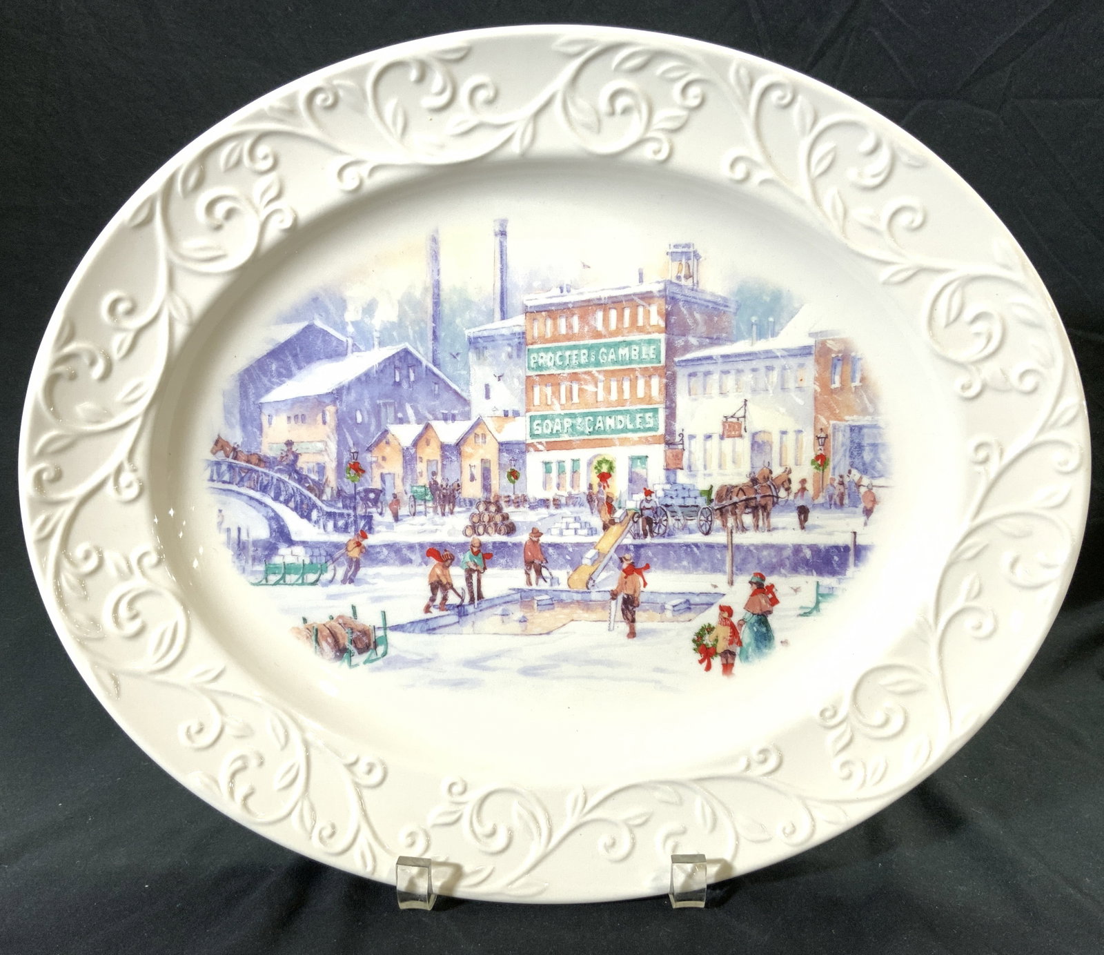 HAPPY HOLIDAYS 2011 PROCTER & GAMBLE Porc Platter: Underside reads HAPPY HOLIDAYS 2011 The image used on this platter depicts Procter & Gambles only factory in the mid nineteenth century. It was located on Central Avenue alone the Miami Erie Canal in 