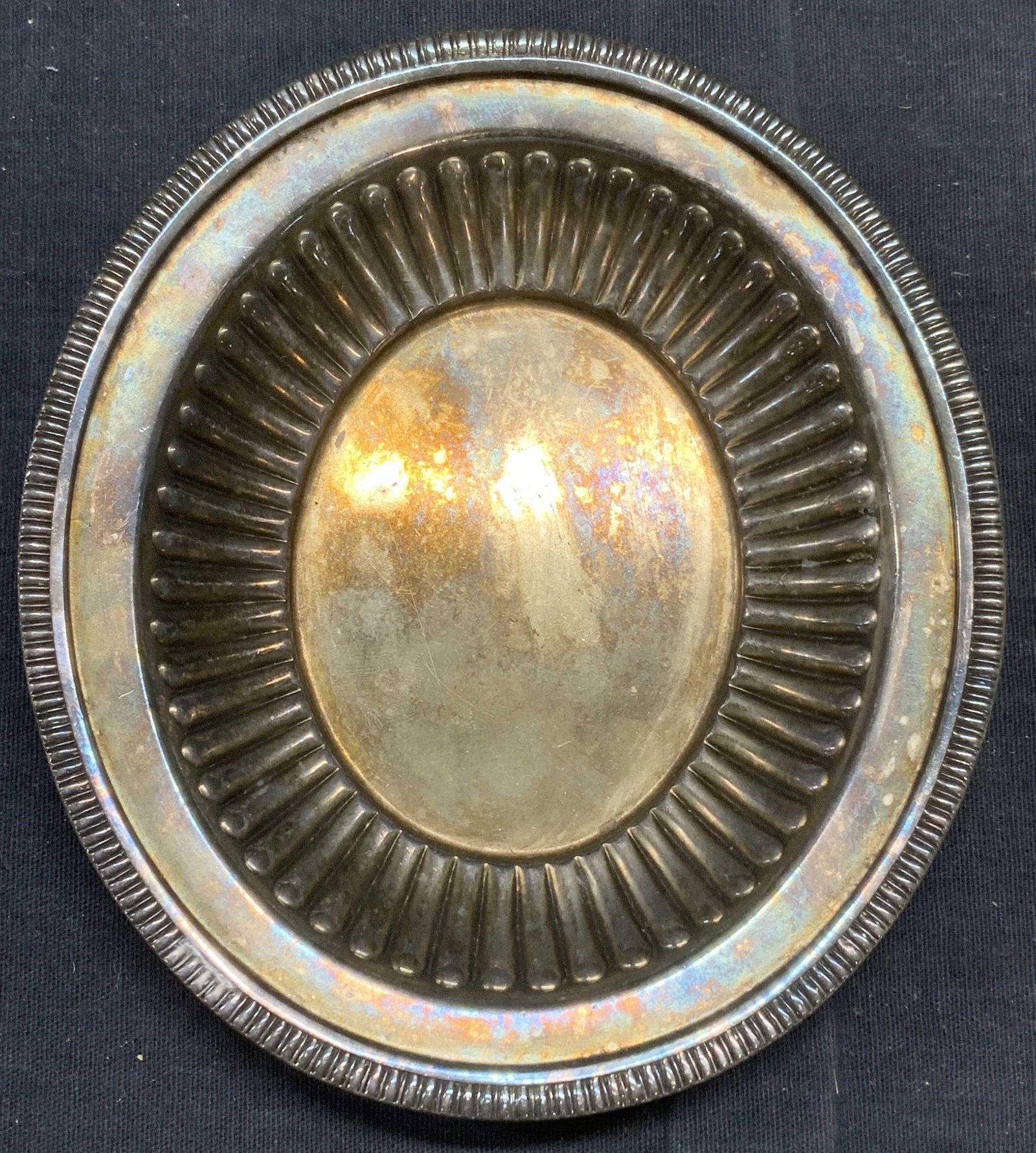 Vintage TIFFANY Silver Ribbed Trinket Dish: Vintage, possibly antique, silver soldered/silver plated trinket dish with ribbed detail. Trademarked to underside, Tiffany & Co Makers, no. 64 68 11 0. Vintage or antique circa first half 20th centur