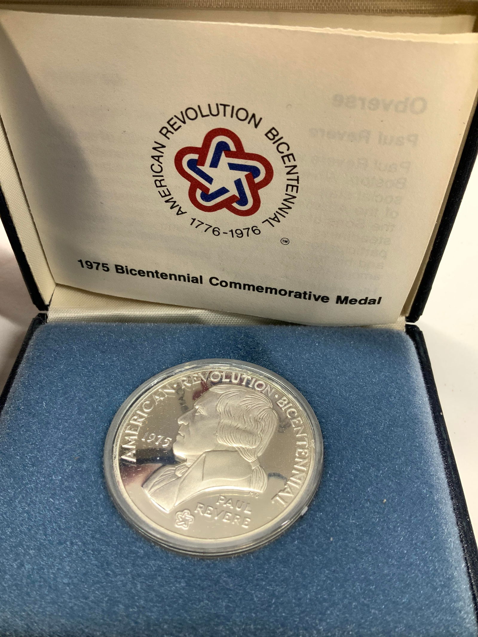 American Revolution Bicentennial Medal in case: 1975 Bicentennial Commemorative Lexington- Concord Metal / Paul Revere profile . Comes with a pamphlet about the history of ‘The Shot Heard Around the World’ and the British encroachment on Boston
