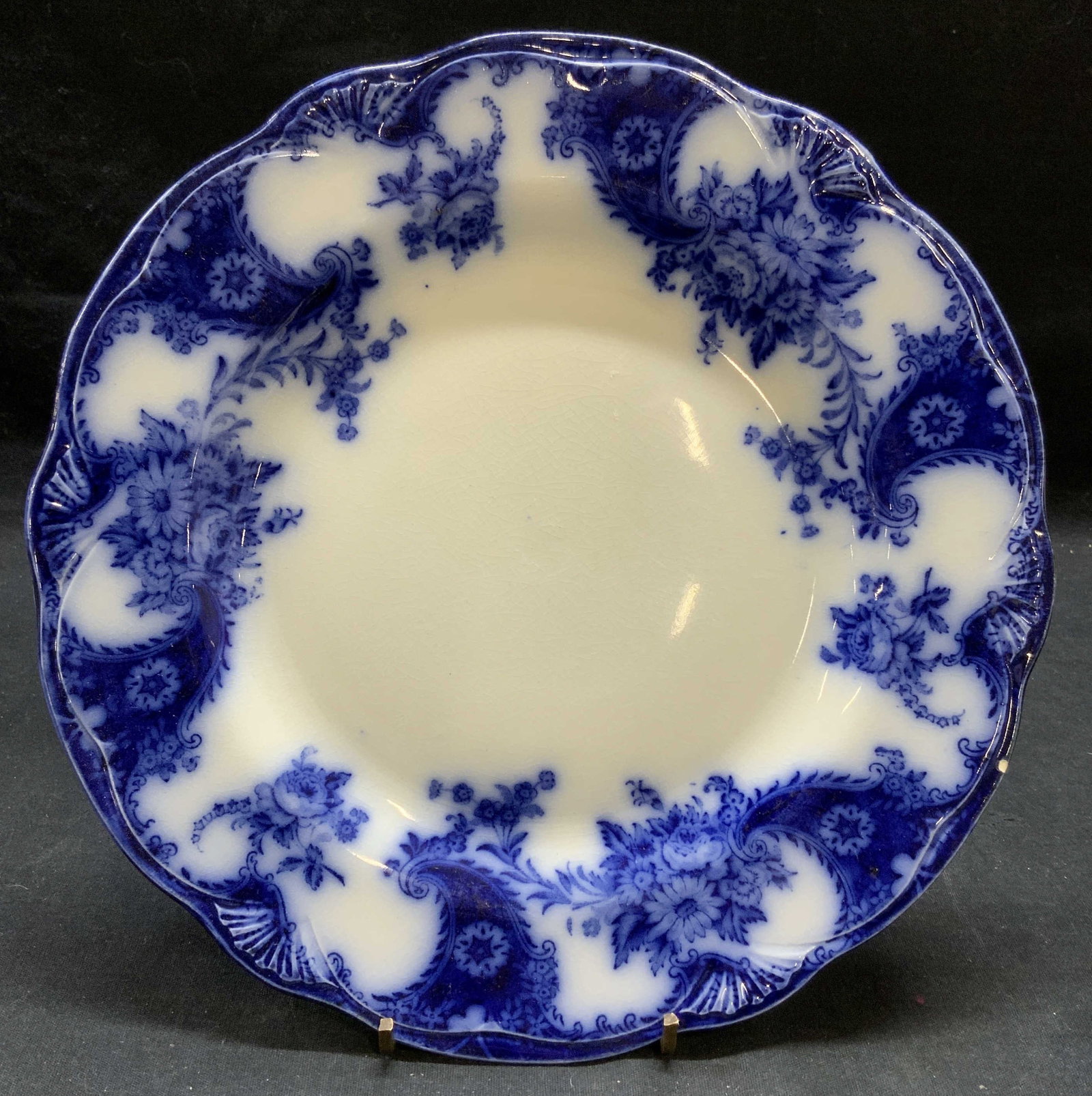 Antique New Wharf Pottery Lois Porc Plate England: Antique New Wharf Pottery Lois pattern porcelain plate. Trademarked to underside. Made in England. Surface wear including crazing, scratching and small chip observed. Measures approx. 9.75 inches diam