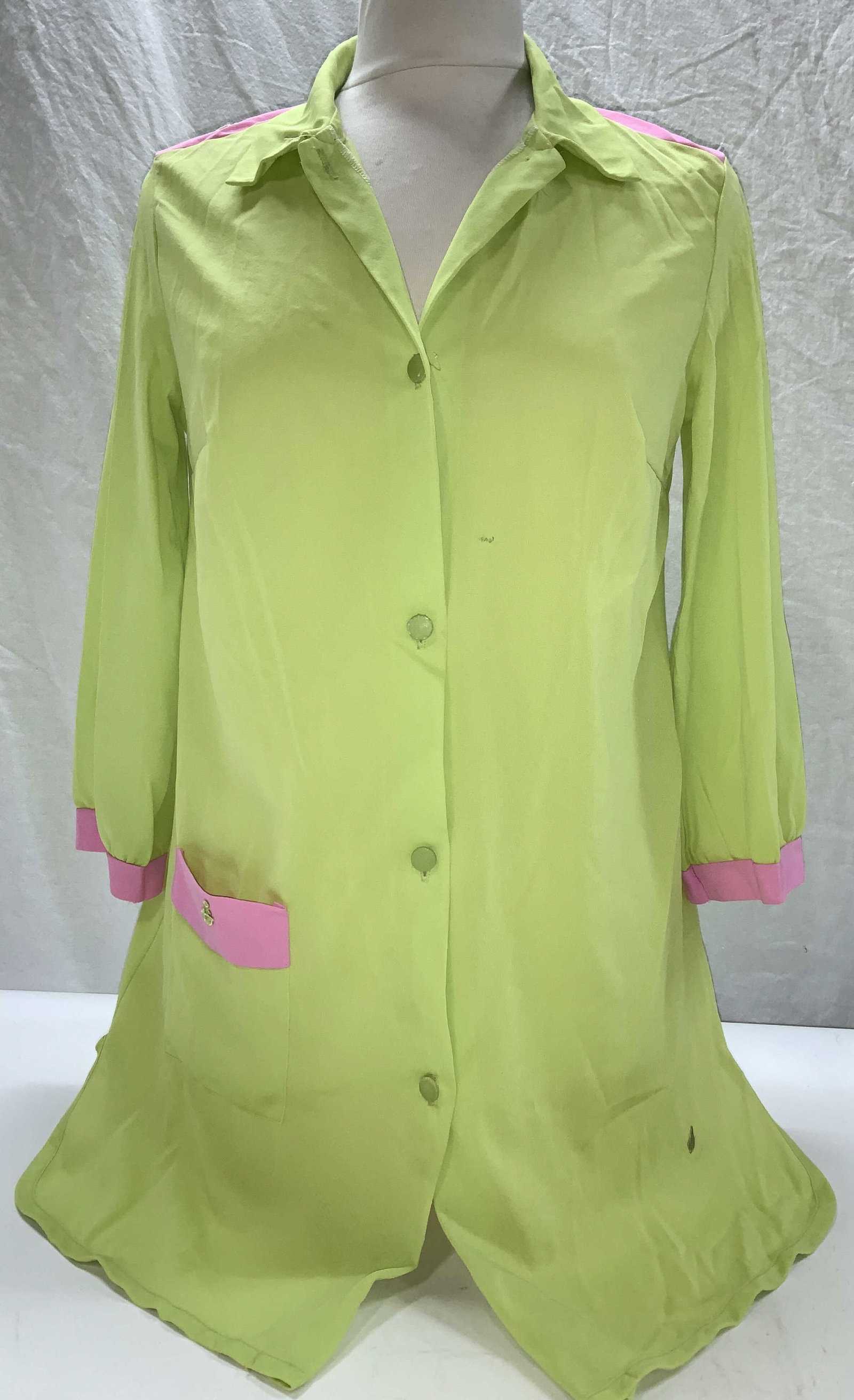 Jennifer Dale Lime Green Vintage Blouse: Vintage size 13/14 lime green long sleeve blouse , labeled designer Jennifer Dale. nylon blouse . Hand pockets, couple of blemishes and wear to button , stitched front above button. Vintage wear, esta