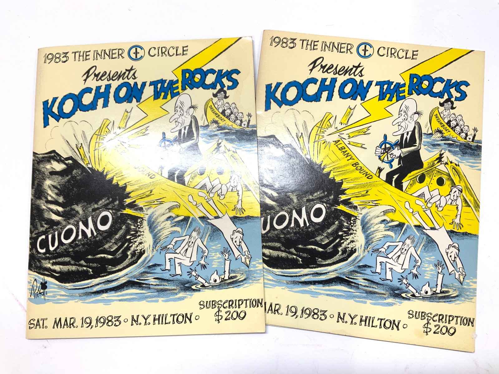 2 Koch on the Rocks Comedy Theater Booklets 1983: 1983 The Inner Circle Koch on the Rocks Radio celebration fundraiser with Musical and Comedy acts, held at the Hilton Hotel in NYC. 11 x 8.5 in. Art by Piero and Schlamp. Musical and comedy shows. Fun