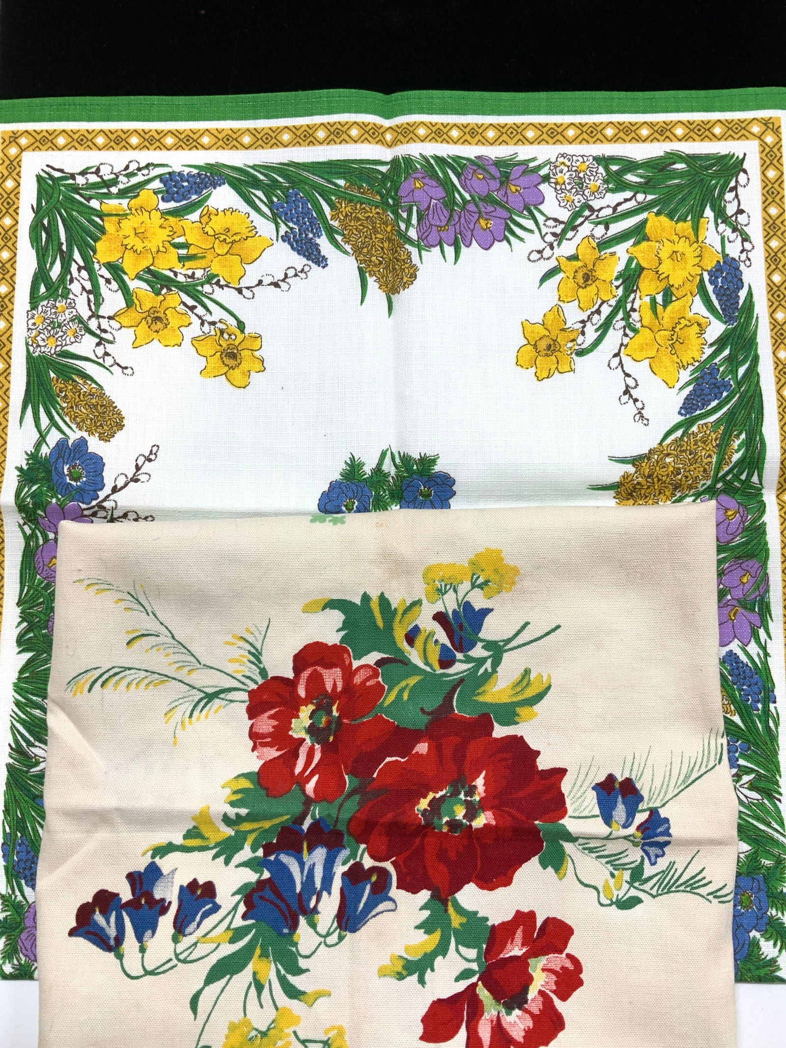 Linen Floral Table Runners/ Furniture Covers 2: Vintage table linens, floral table runners or furniture covers , both rectangular. One is new old stock, possibly not used , green border with bright yellow daffodils and other colorful flowers on whi