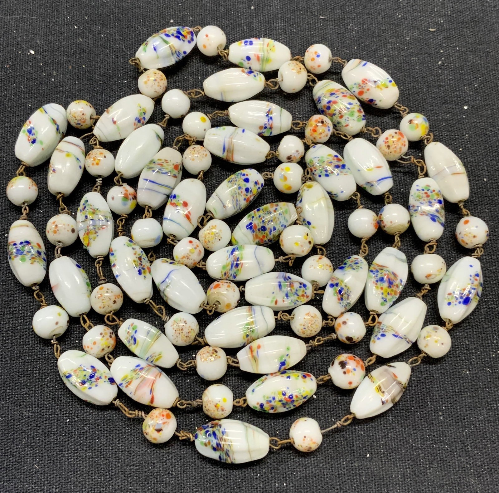 Vintage Hand Painted Glass Beaded Necklace: Vintage hand painted glass beaded necklace. Some surface wear including scratching and tarnishing to metal observed. Drop length approx. 24 inches. Estate jewelry, costume jewelry, cocktail jewelry, f