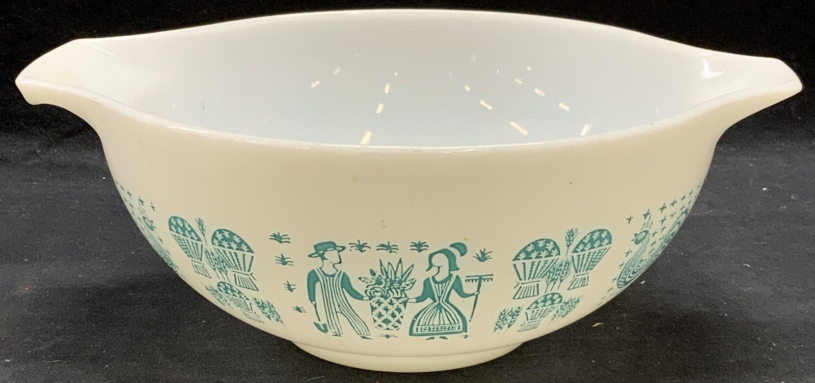Vintage Pyrex Butterprint Glass Mixing Bowl: Vintage Pyrex Butterprint glass mixing bowl in white and blue. Trademarked to underside. Measures approx. 8.75 x 3.75 inches. Some surface wear including scratches observed. Pyrex, vintage Pyrex, Pyre