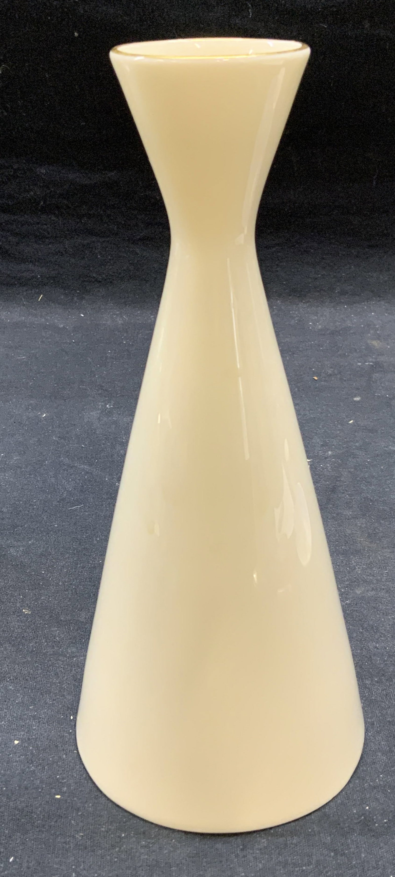 Lenox Gilt Porcelain Vase: Lenox porcelain vase with gilt rim. Trademarked to underside. Measures approx. 3.5 x 8 inches. Some surface wear consistent with exposure. Lenox. Lenox vase, porcelain vase, white vase, gilt vase, col