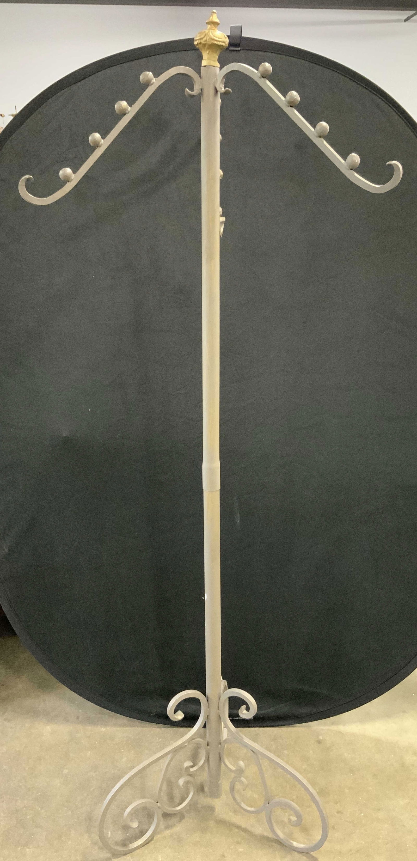 Vntg Victorian style Metal Coat Rack: Coat rack is vintage. Piece is metal. Coat rack has Victorian stylings with c and s curve supports. Piece has 3 elongated s shaped hooks with 4 spherical structures each. coat rack measures approximat