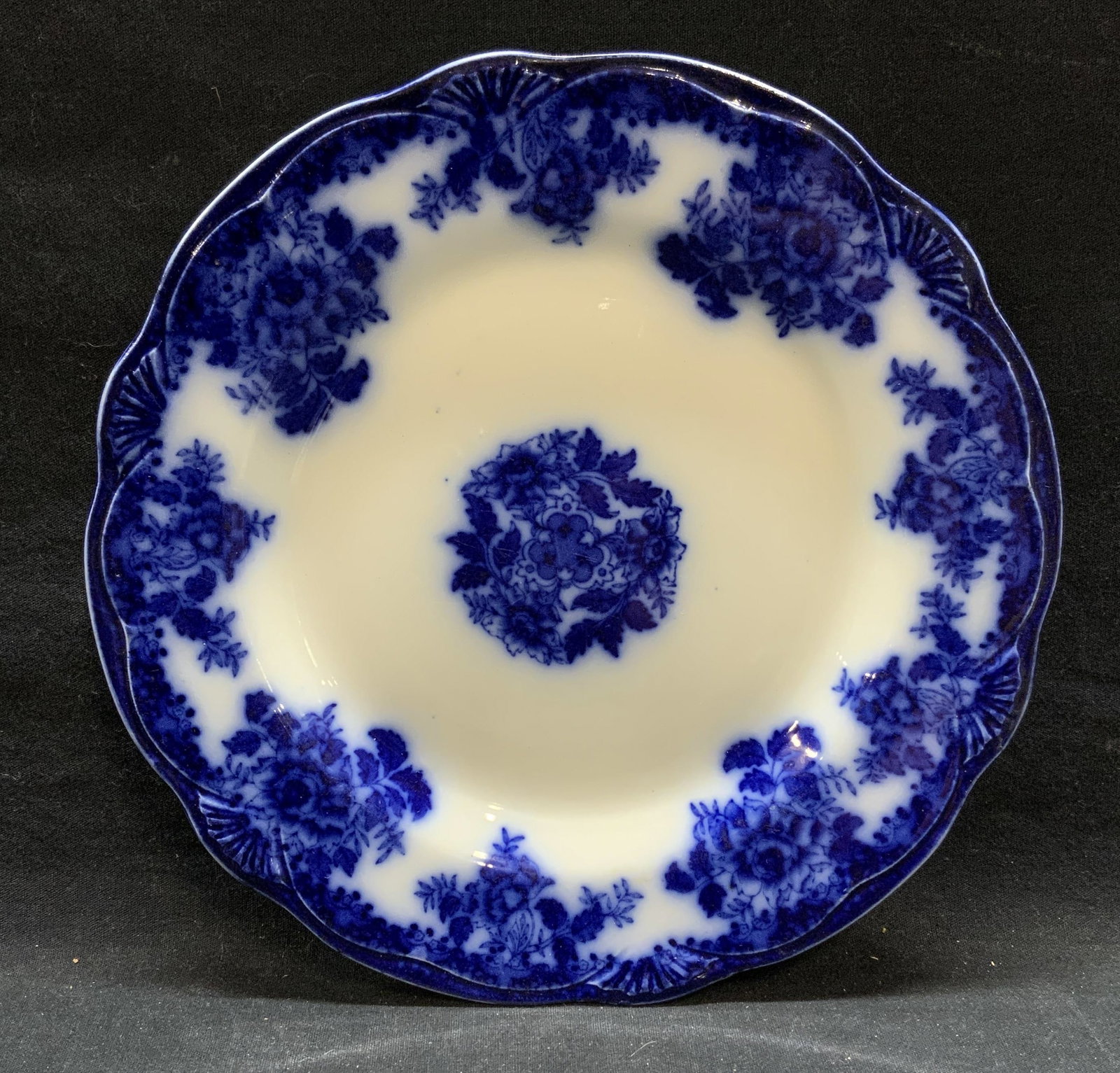 Antique New Wharf Waldorf Porcelain Plate: Antique New Wharf Pottery semi porcelain plate in Waldorf pattern. Trademarked tomunderside. Made in England. Some surface wear including scratching observed. Measure approx. 9.75 inches inches diamet