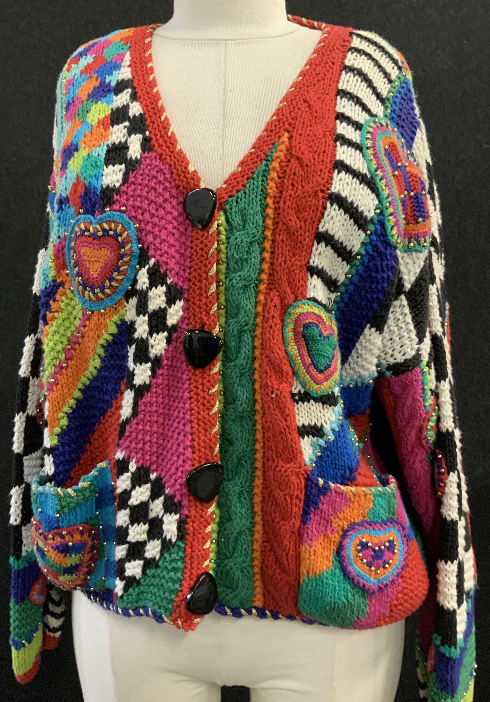 Neiman Marcus Cotton Blend Britto Style Cardigan: Vivid knit cardigan with every color of the rainbow and distinct pattern in the style of Romero Britto. 55% ramie, 45% cotton. Added accented of gold tone seed beads and metallic gold . Added knit Pat