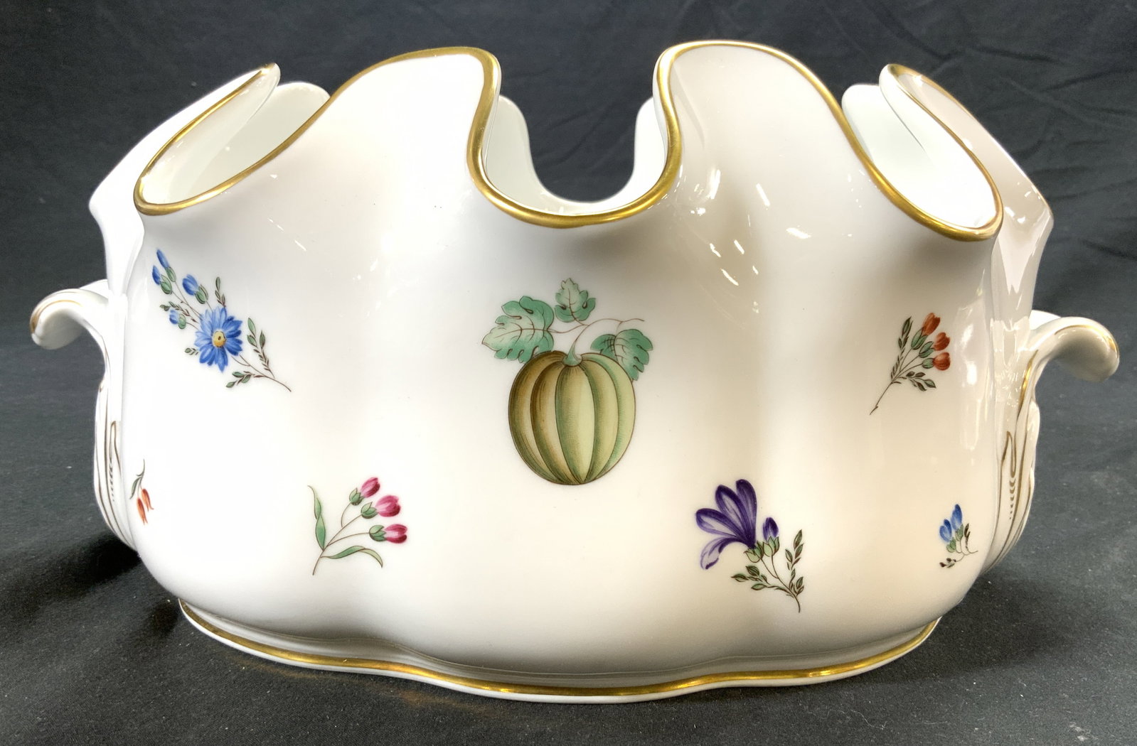 RICHORD GINORI Gilt Rim Vessel ITALY: Underside is marked RICHARD GINORI MANIFACTURA DI DOCCIA FLORENCE ITALY. Piece has handkerchief style gilt rim. Vessel has multi toned floral & leaf detail. Piece measures approx 12 inches wide 8.5 in