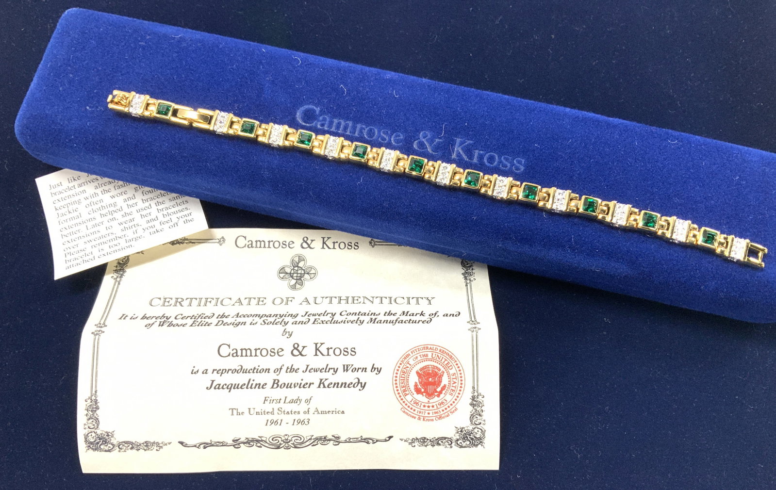 Jaqueline Kennedy 24k GP SWAROVSKI Bracelet, NIP: New in box, Authentic reproduction jewelry of First Lady Jacqueline Kennedy by Camrose & Kross with Certificate of Authenticity and in original blue box. This bracelet is made with emerald and clear S