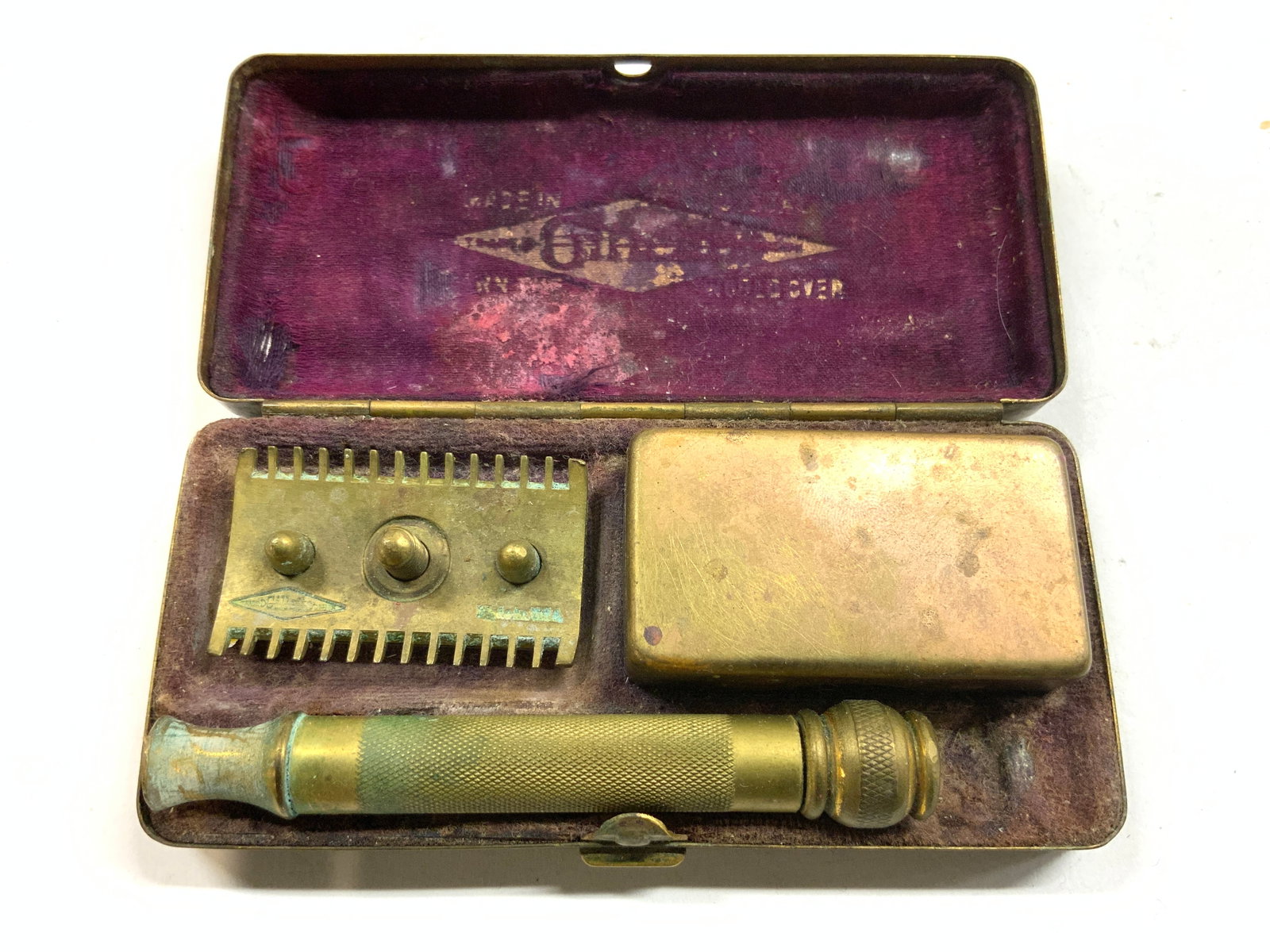GILLETTE Vntg Brass Razor & Case: Razor head is trademarked GILLETTE. Lot includes brass screw on razor, & blade case inside lidded case. Outer case is gold toned, appears to be brass. Outer case measures approximately 4 inches long 2