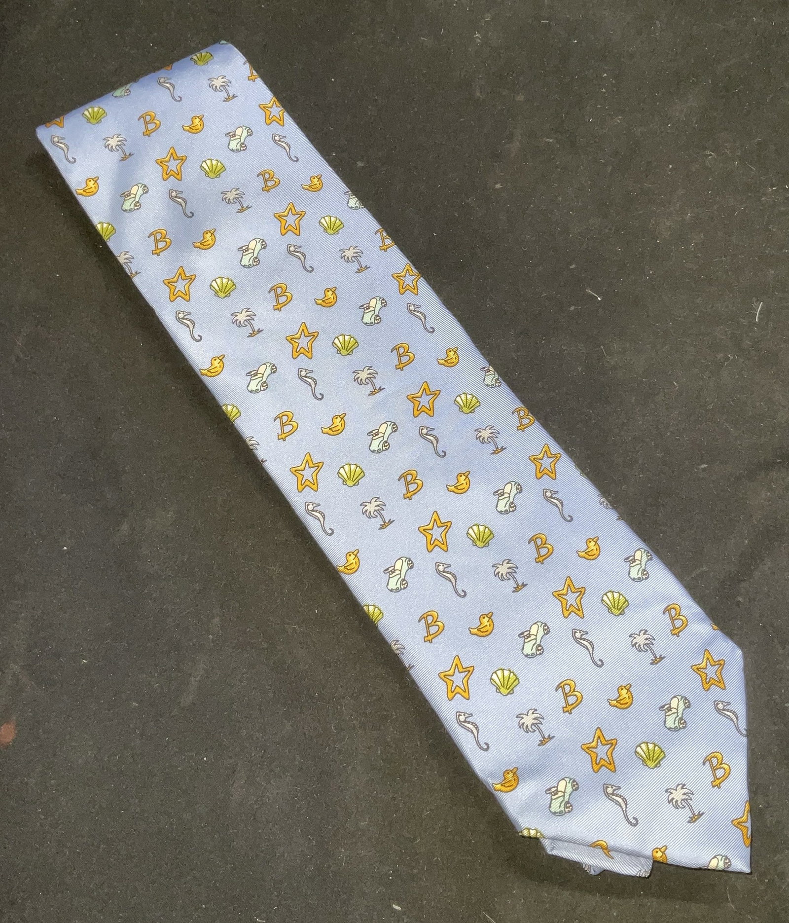 BMW LIFESTYLE Beach Motif Silk Tie NIP: New in package silk tie , designer BMW LIFESTYLE. Baby blue with shells, Stars, palm trees, seahorse, car, ducks. 4 in. W .55.25 in. L imported by BMW, BMW ties collection, luxury tie collection Mens 
