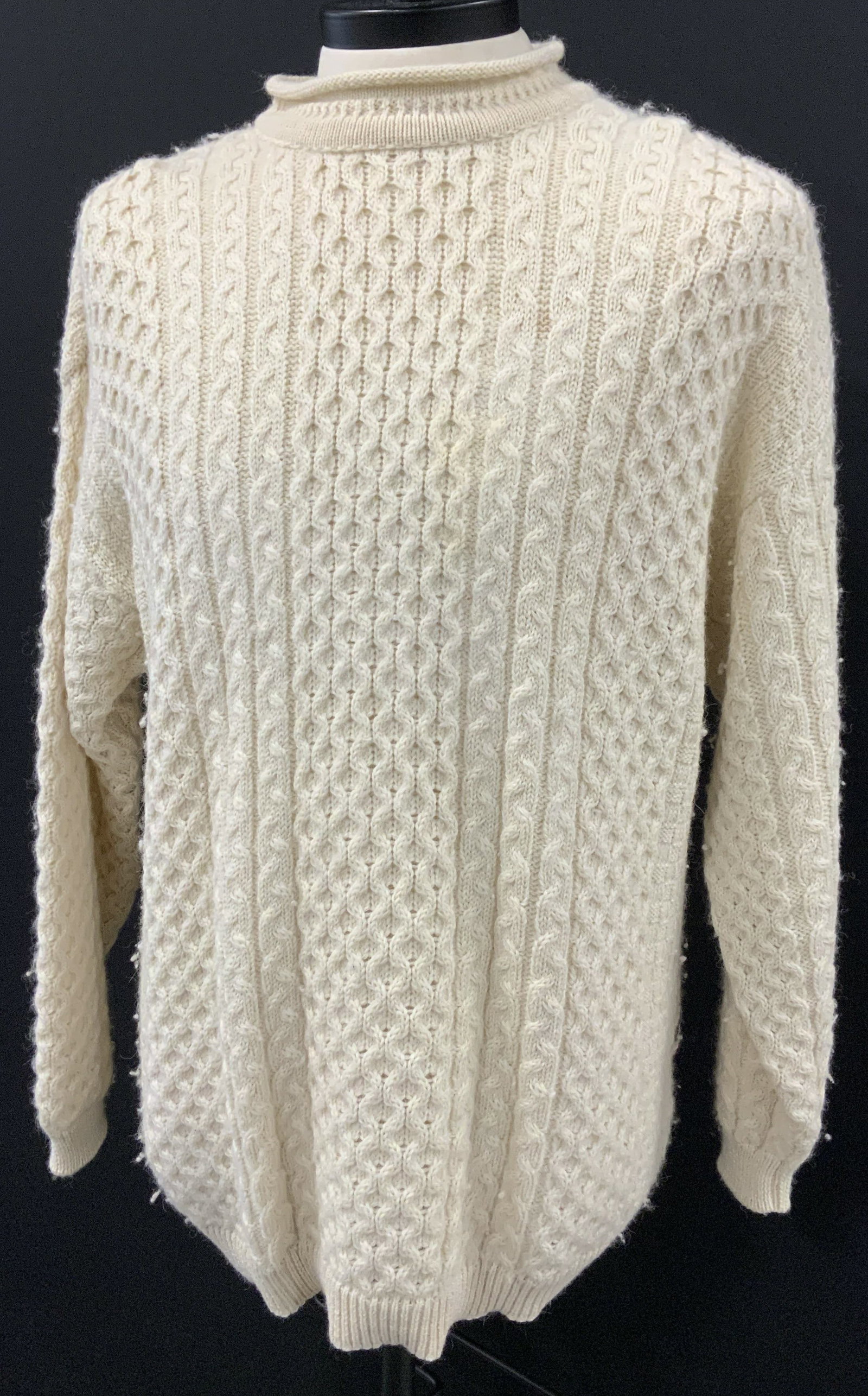 GAELTARRA ALPACA & WOOL SWEATER, IRELAND: Off white cable knit thick and luxurious Irish wool and alpaca sweater ( 50/50) . Possibly hand knit. Rolled crew neck. Mens size Medium. Unisex wear. Labeled designer GAELTARRA. 30.5 in. Long,, 42 in