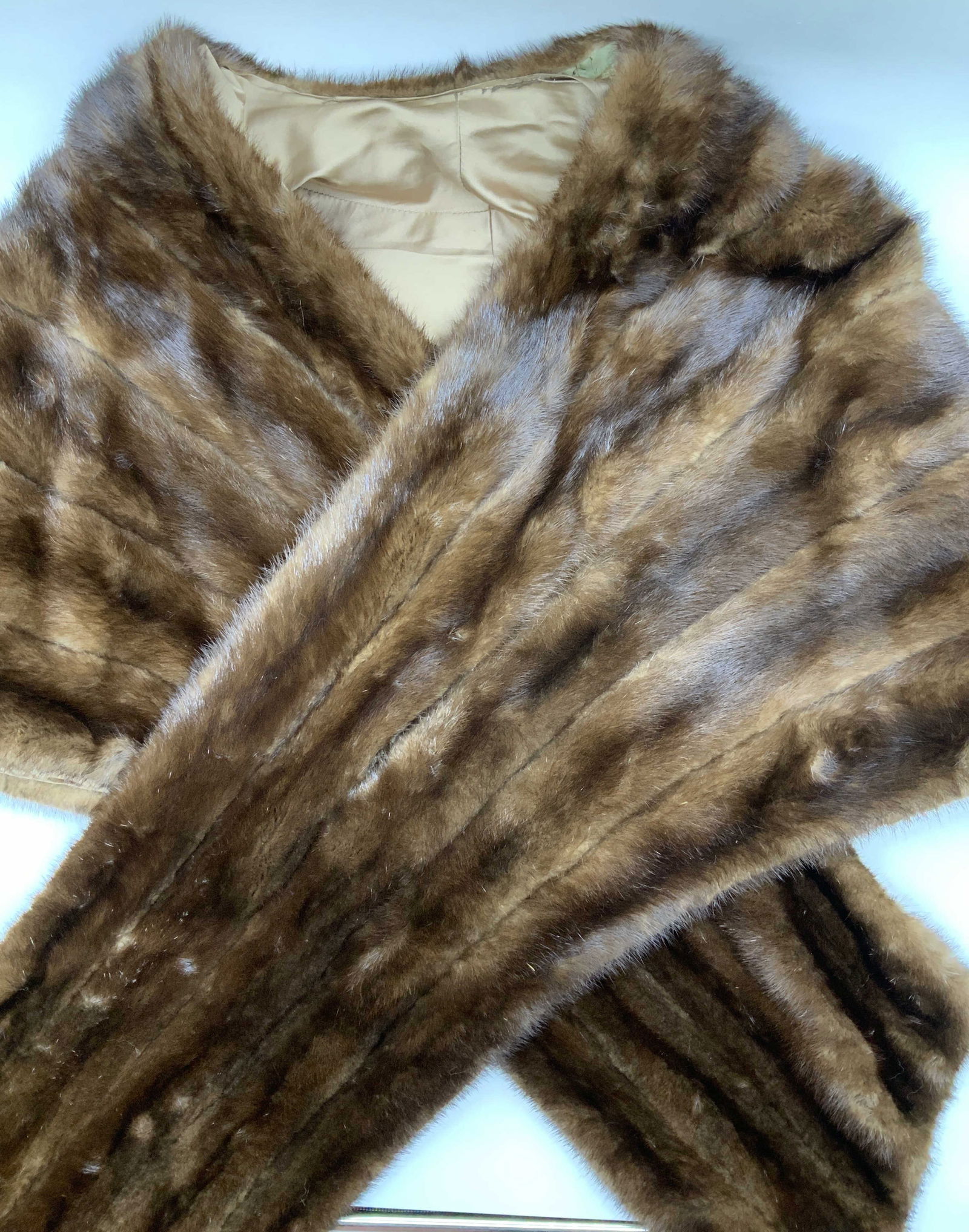 Vintage Mink & Silk Stole, Custom Made: Dark chocolate mink fur stole with bronze silk lining. 17 in. Neck to waist, total length 74 in. Needs a bit of stitching lining to pelt along neck, see picture. Embroidered with name Jill Ober . Mink