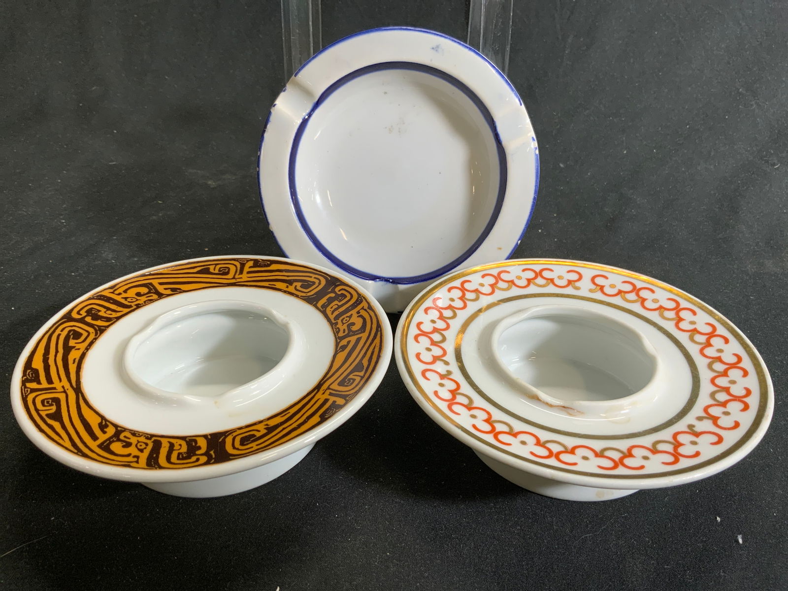 Lot 3 Trademarked Porcelain Trinket Dishes: Lot includes 1 dish marked SS MADE IN ITALY (white with blue toned floral garland detail, 2 are marked NORITAKE (One with gilt rim & one with brown and beige toned tribal detailed rim. Each piece is v